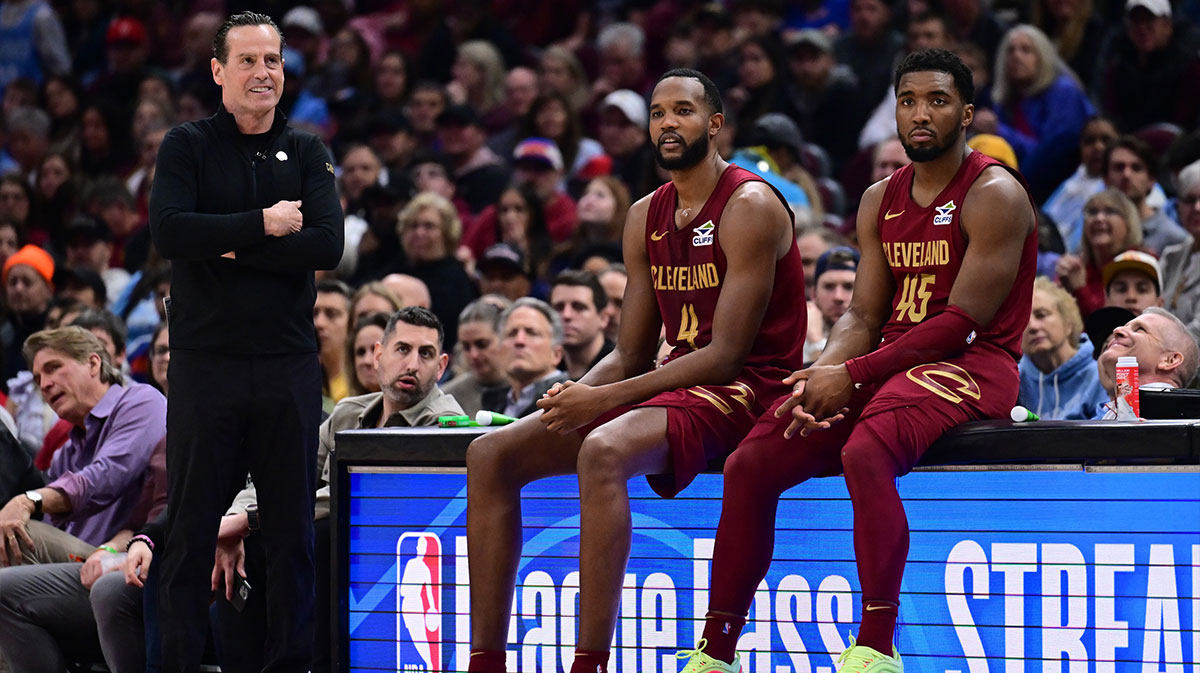 Cleveland Cavaliers forward Evan Mobley (4) and guard Donovan Mitchell (45) wait along side head coach Kenny Atkinson to enter the game during the first half against the New York Knicks at Rocket Arena. 