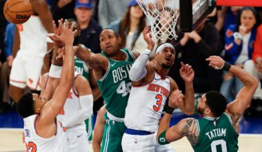 Boston Celtics forward Al Horford (middle left) fights for possession near New York Knicks guard Josh Hart (3) during the second quarter.