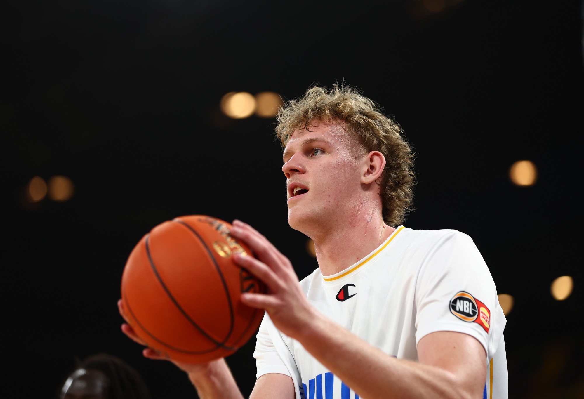 BRISBANE, AUSTRALIA - DECEMBER 12: Rocco Zikarsky of the Bullets warms up during the round 12 NBL match between Brisbane Bullets and South East Melbourne Phoenix at Brisbane Entertainment Centre, on December 12, 2024, in Brisbane, Australia. (Photo by Chris Hyde/Getty Images)