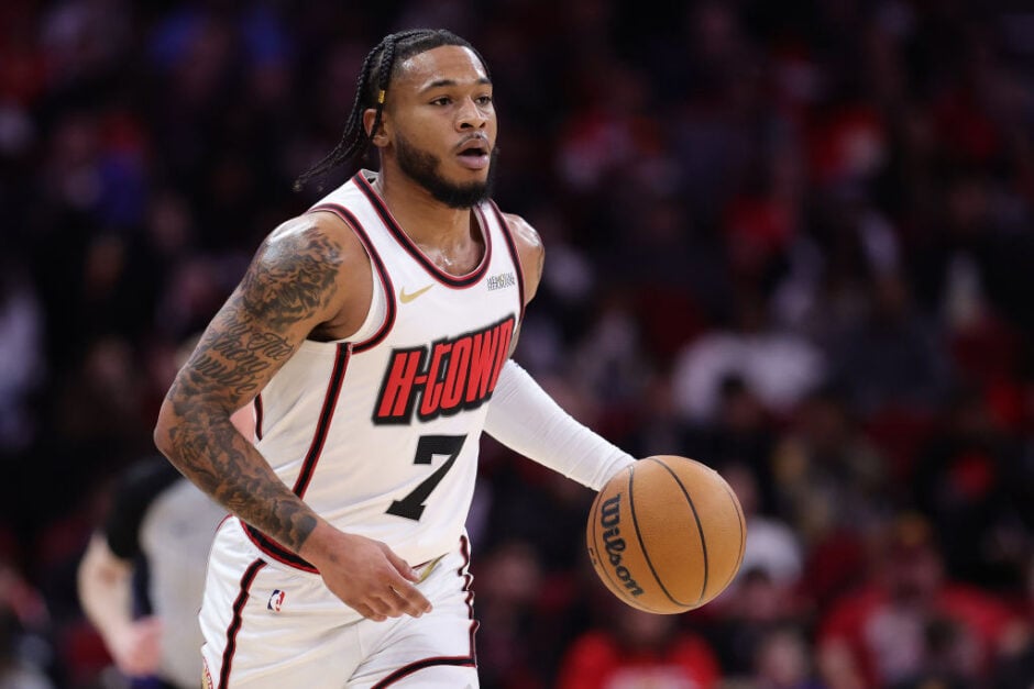 Cam Whitmore #7 of the Houston Rockets handles the ball against the Golden State Warriors during the first half at Toyota Center on February 13, 2025 in Houston, Texas.