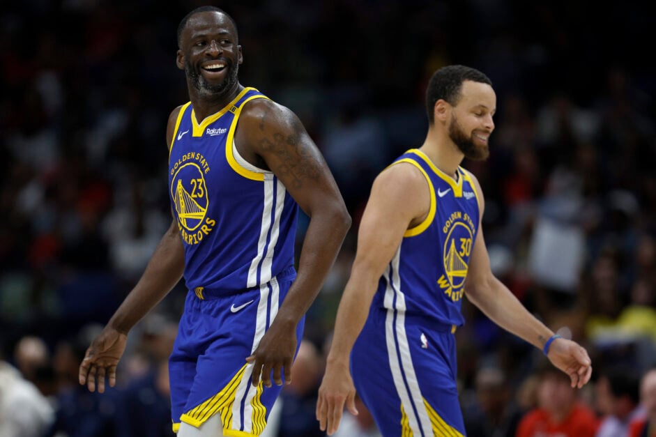 Stephen Curry #30 of the Golden State Warriors and Draymond Green #23 of the Golden State Warriors