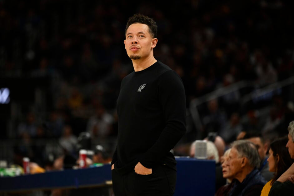 Former assistant coach Mitch Johnson of the San Antonio Spurs looks on against the Golden State Warriors in the fourth quarter at Chase Center.