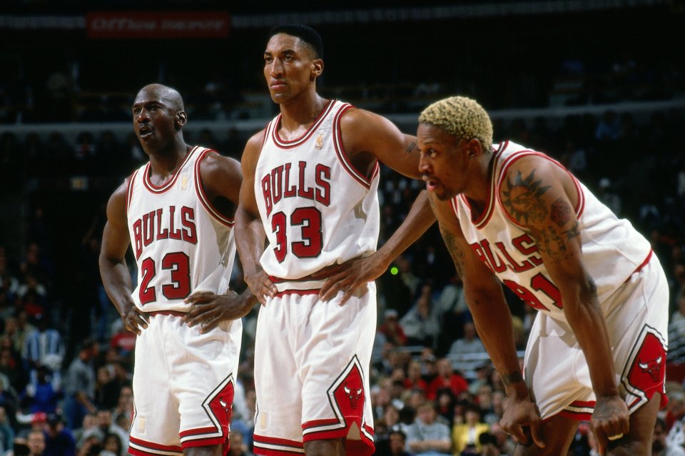 CHICAGO - 1997: Michael Jordan #23, Scottie Pippen #33 and Dennis Rodman #91 of the Chicago Bulls catch their breath during a 1997 NBA game at the United Center in Chicago, Illinois. NOTE TO USER: User expressly acknowledges that, by downloading and or using this photograph, User is consenting to the terms and conditions of the Getty Images License agreement. Mandatory Copyright Notice: Copyright 1997 NBAE (Photo by Andrew D. Bernstein/NBAE via Getty Images)