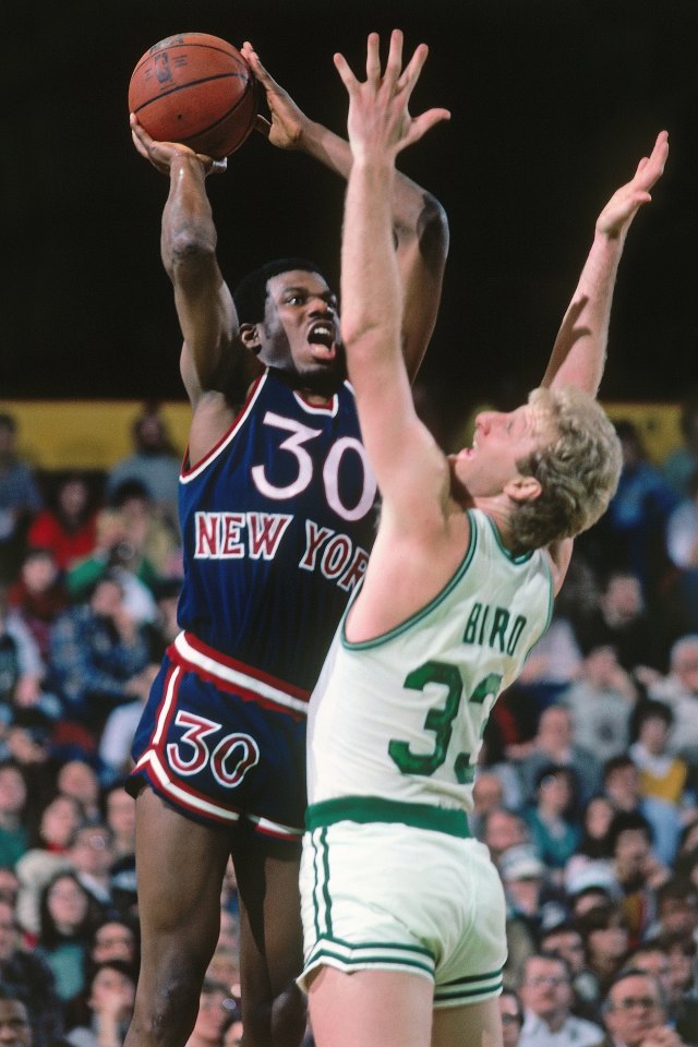 BOSTON - 1983: Bernard King #30 of the New York Knicks goes up for a shot against Larry Bird #33 of the Boston Celtics during a game played in 1983 at the Boston Garden in Boston, Massachusetts. NOTE TO USER: User expressly acknowledges and agrees that, by downloading and or using this photograph, User is consenting to the terms and conditions of the Getty Images License Agreement. Mandatory Copyright Notice: Copyright 1983 NBAE (Photo by Dick Raphael/NBAE via Getty Images)