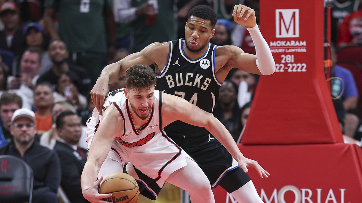 Milwaukee Bucks forward Giannis Antetokounmpo (34) defends against Houston Rockets center Alperen Sengun (28) during the fourth quarter at Toyota Center.