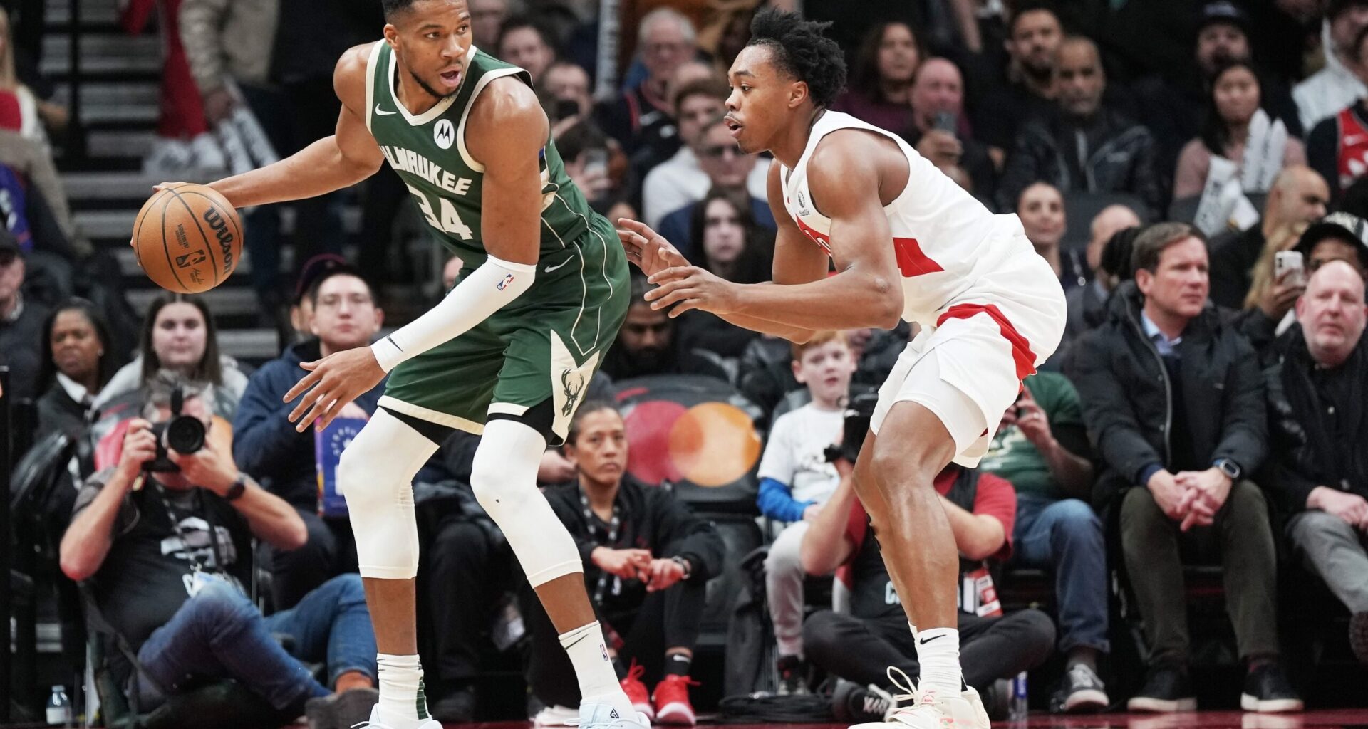 Milwaukee Bucks trade candidate Giannis Antetokounmpo guarded by Toronto Raptors forward Scottie Barnes