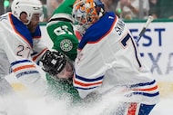 Dallas Stars center Colin Blackwell (15) collides with Edmonton Oilers goaltender Stuart...