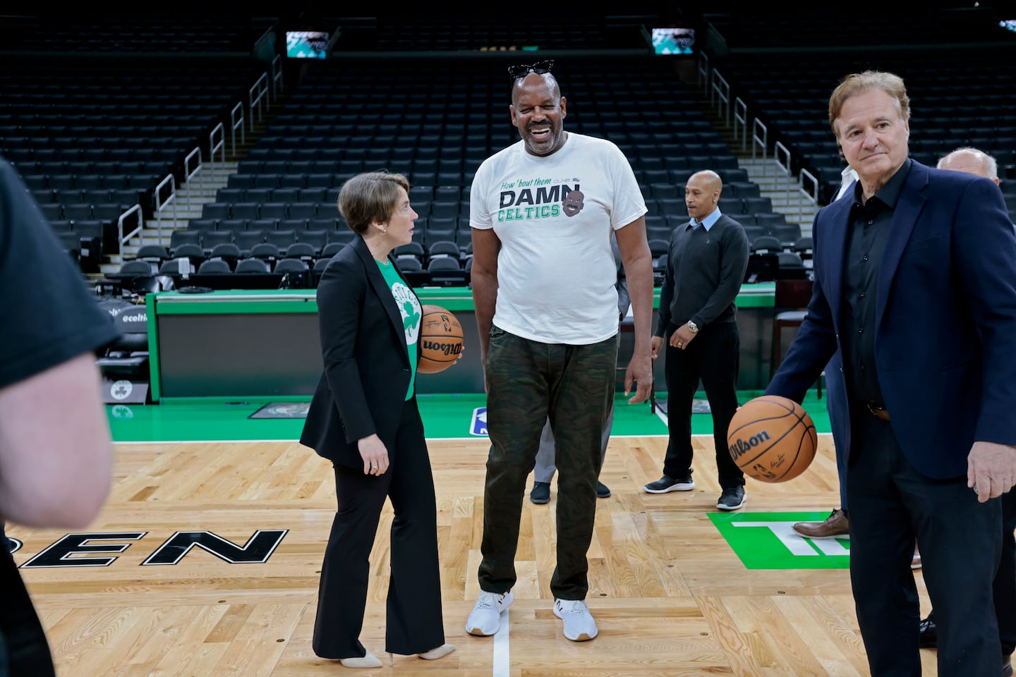 Cedric Maxwell (center) played 11 seasons in the NBA.