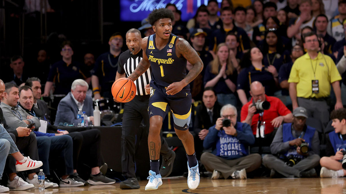 Marquette Golden Eagles guard Kam Jones (1) brings the ball up court against the St. John's Red Storm during the first half at Madison Square Garden.