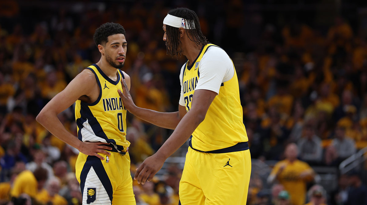 Indiana Pacers guard Tyrese Haliburton (0) and center Myles Turner (33) talk during the third quarter of game three of the eastern conference finals for the 2025 NBA Playoffs at Gainbridge Fieldhouse.