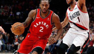 Kawhi Leonard driving against Evan Turner