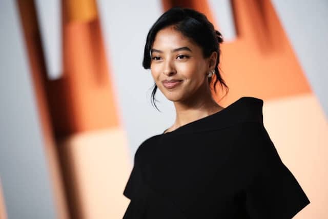 Jeanie Buss Presents Natalia Bryant With Diploma At USC Graduation