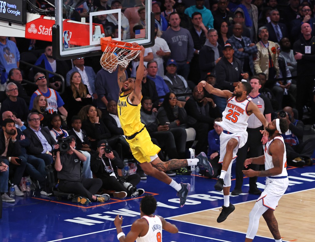 Obi Toppin slams home a dunk after the Knicks were unable to foul him in the closing seconds of overtime in their 138-135 Game 1 loss to the Pacers on May 21, 2025.