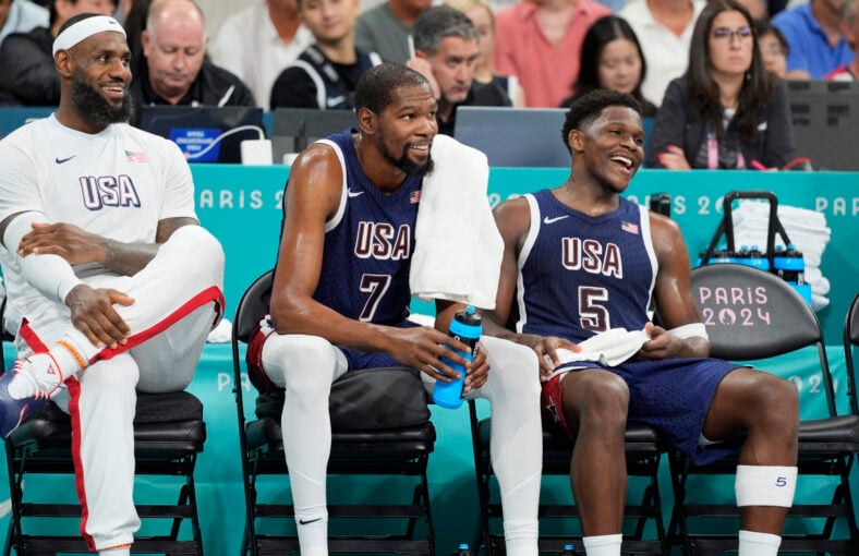 Minnesota Timberwolves star Anthony Edwards sitting next to Kevin Durant on Team USA