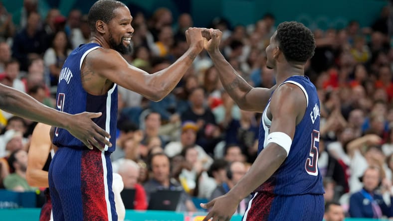 Minnesota Timberwolves star Anthony Edwards celebrating with Kevin Durant on Team USA