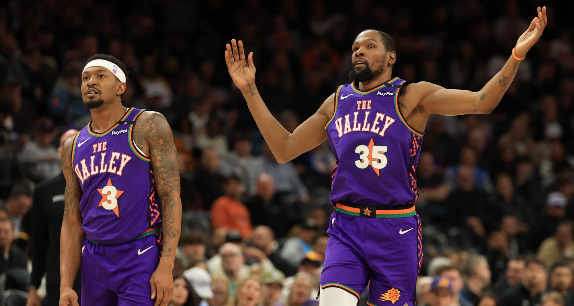 Phoenix Suns forward Kevin Durant (35) reacts alongside Bradley Beal (3) against the Sacramento Kings at Footprint Center.