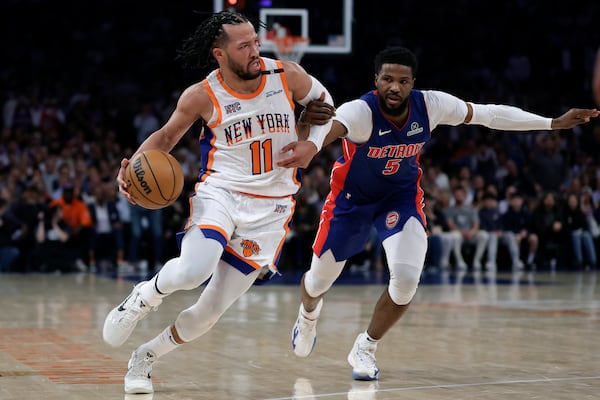 New York Knicks guard Jalen Brunson (11) drives past Detroit Pistons guard Malik Beasley in the second half during Game 5 in an NBA basketball first-round playoff series Tuesday, April 29, 2025, in New York. (AP Photo/Adam Hunger)