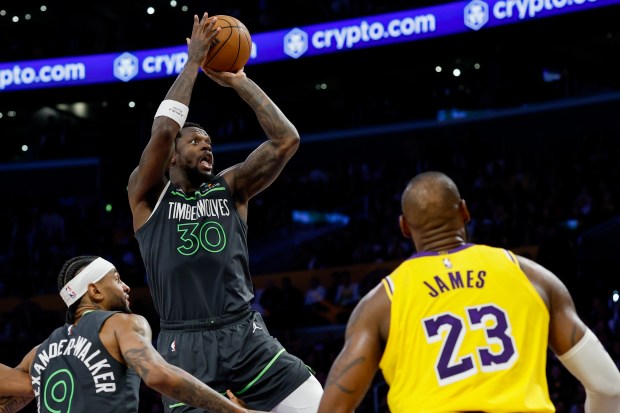 Julius Randle #30 of the Minnesota Timberwolves shoots the ball against the Los Angeles Lakers during the fourth quarter in Game Five of the Western Conference First Round NBA Playoffs at Crypto.com Arena on April 30, 2025 in Los Angeles, California. NOTE TO USER: User expressly acknowledges and agrees that, by downloading and or using this photograph, User is consenting to the terms and conditions of the Getty Images License Agreement. (Photo by Harry How/Getty Images)