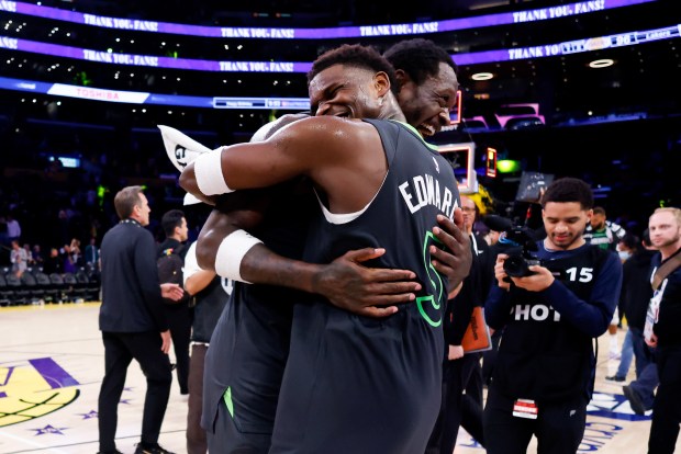 Julius Randle #30 and Anthony Edwards #5 of the Minnesota Timberwolves celebrate after defeating the Los Angeles Lakers in Game Five of the Western Conference First Round NBA Playoffs at Crypto.com Arena on April 30, 2025 in Los Angeles, California. NOTE TO USER: User expressly acknowledges and agrees that, by downloading and or using this photograph, User is consenting to the terms and conditions of the Getty Images License Agreement. (Photo by Harry How/Getty Images)