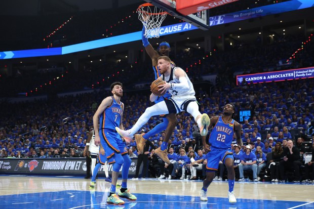 Donte DiVincenzo #0 of the Minnesota Timberwolves comes pulls down a rebound during the second quarter of a game against the Oklahoma City Thunder in Game Two of the Western Conference Finals of the 2025 NBA Playoffs at Paycom Center on May 22, 2025 in Oklahoma City, Oklahoma. NOTE TO USER: User expressly acknowledges and agrees that, by downloading and or using this photograph, User is consenting to the terms and conditions of the Getty Images License Agreement. (Photo by Matthew Stockman/Getty Images)