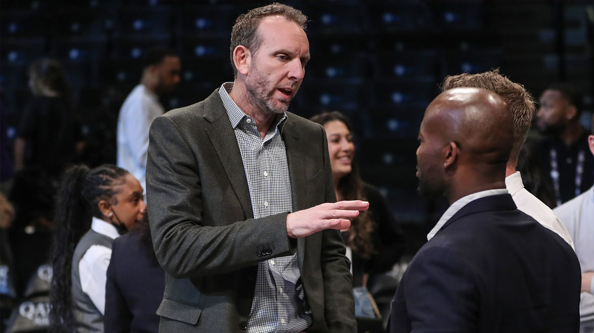 Brooklyn Nets General Manager Sean Marks speaks to a group of people prior to the game against the Atlanta Hawks at Barclays Center.