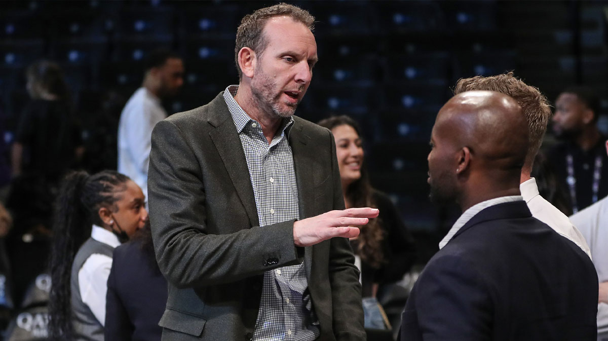 Brooklyn Nets General Manager Sean Marks speaks to a group of people prior to the game against the Atlanta Hawks at Barclays Center.