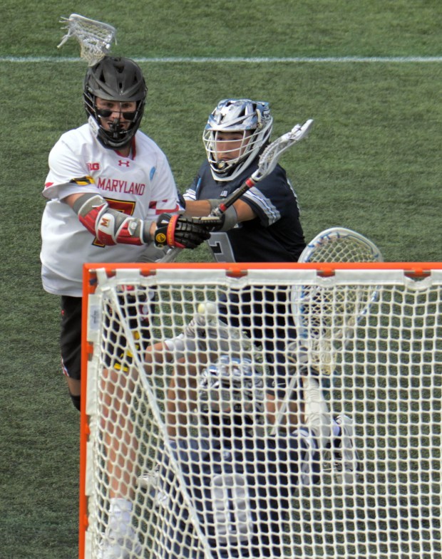 Maryland Terrapins attack Eric Spanos fires past Georgetown Hoyas defender...