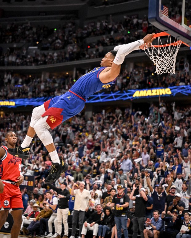 Russell Westbrook of the Denver Nuggets hangs for a technical after dunking to ignite the crowd during the fourth quarter of the Nuggets' 120-101 series-clinching win over the LA Clippers at Ball Arena in Denver on Saturday, May 3, 2025. The Denver Nuggets defeated the LA Clippers 4-3 in their best-of-seven NBA Playoffs series. (Photo by AAron Ontiveroz/The Denver Post)