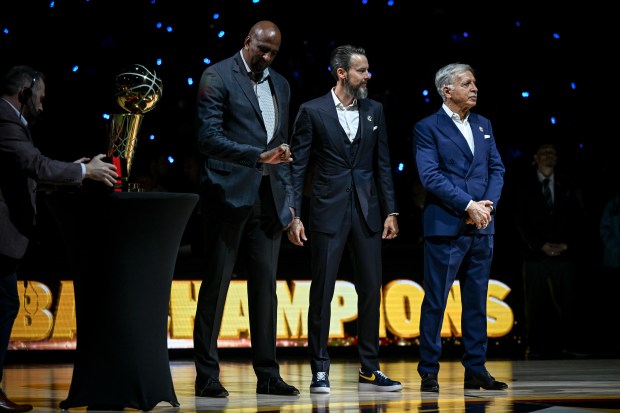 DENVER, CO - OCTOBER 24: Denver Nuggets general manager Calvin Booth, team president Josh Kroenke and owner Stan Kroenke stand during the team's ring ceremony before the first quarter against the Los Angeles Lakers at Ball Arena in Denver on Tuesday, October 24, 2023. (Photo by AAron Ontiveroz/The Denver Post)