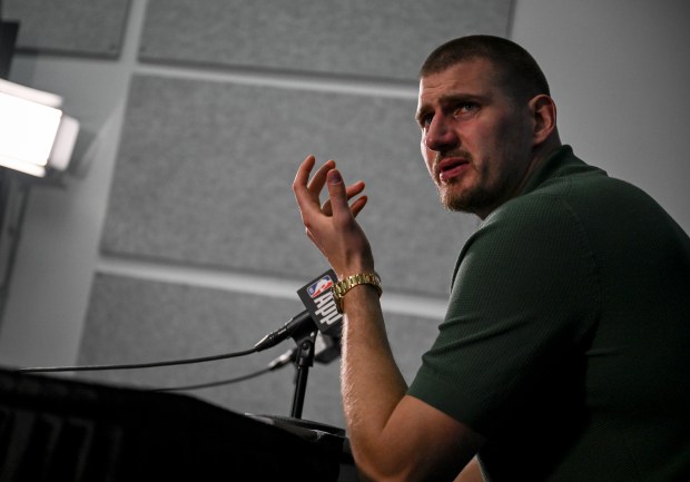 Nikola Jokic (15) of the Denver Nuggets speaks to members of the media after the Oklahoma City Thunder's 125-93 win at Paycom Center in Oklahoma City on Sunday, May 18, 2025. The Oklahoma City Thunder defeated the Denver Nuggets 4-3 in their best-of-seven Western Conference semifinal series. (Photo by AAron Ontiveroz/The Denver Post)