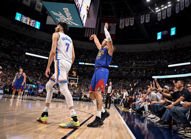 Aaron Gordon (32) of the Denver Nuggets holds his form...