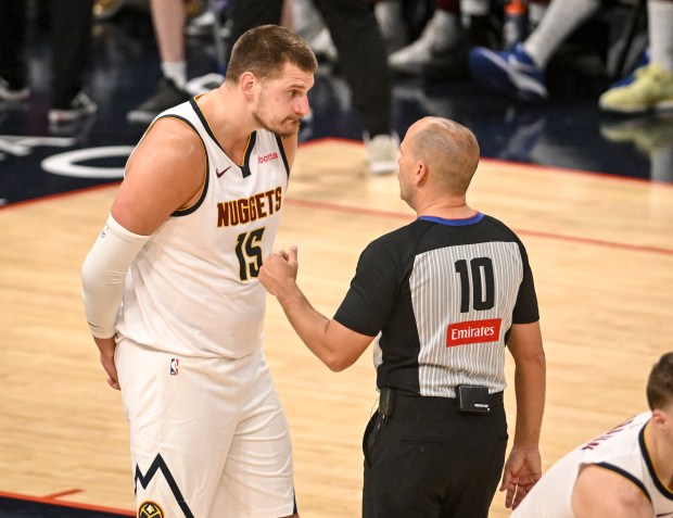 Nikola Jokic (15) of the Denver Nuggets disputes a foul call with referee John Goble (10) during the third quarter of the Nuggets' 121-119 win over the Oklahoma City Thunder at Paycom Center in Oklahoma City, Oklahoma on Monday, May 5, 2025. The Nuggets took a 1-0 Western Conference semifinal lead with their win. (Photo by AAron Ontiveroz/The Denver Post)