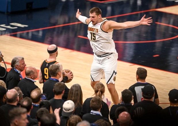 Nikola Jokic (15) of the Denver Nuggets defends an inbound pass by Alex Caruso (9) of the Oklahoma City Thunder during the fourth quarter of the Nuggets' 121-119 win at Paycom Center in Oklahoma City, Oklahoma on Monday, May 5, 2025. The Nuggets took a 1-0 Western Conference semifinal lead with their win. (Photo by AAron Ontiveroz/The Denver Post)