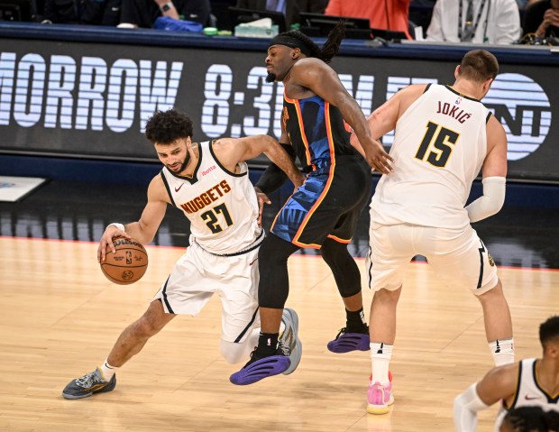 Nikola Jokic (15) of the Denver Nuggets commits his sixth...