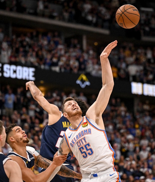 Isaiah Hartenstein (55) of the Oklahoma City Thunder swats a...