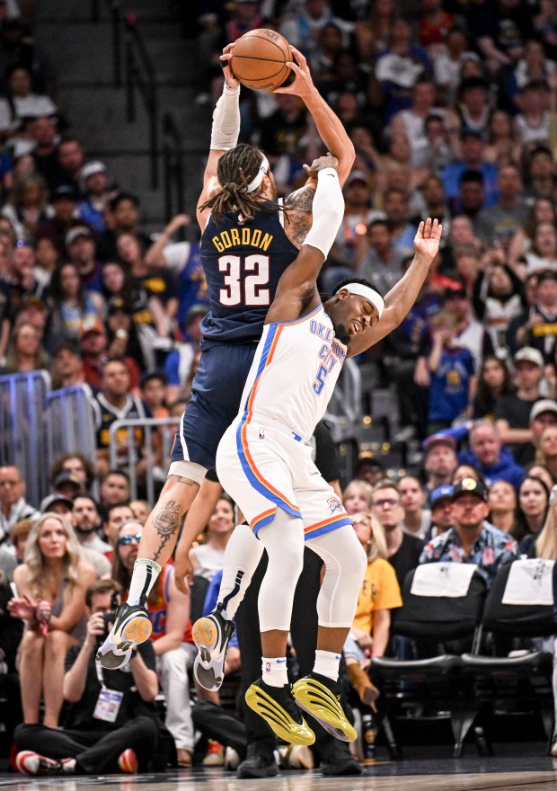 Aaron Gordon (32) of the Denver Nuggets grabs a rebound...