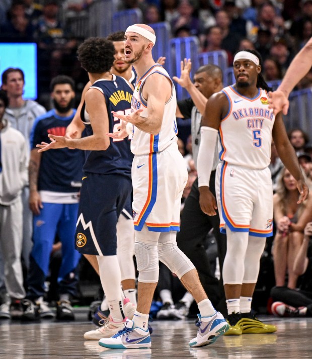 Alex Caruso (9) of the Oklahoma City Thunder reacts to...