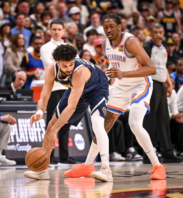 Jamal Murray (27) of the Denver Nuggets dribbles as Jalen...