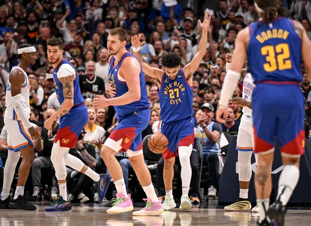 Jamal Murray (27) of the Denver Nuggets raises his hands...