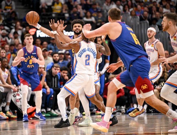 Cason Wallace (22) and Shai Gilgeous-Alexander (2) of the Oklahoma...