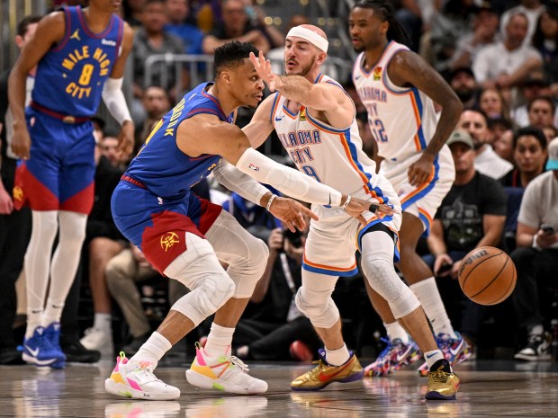 Russell Westbrook (4) of the Denver Nuggets passes as Alex...