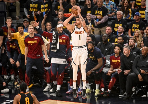 Michael Porter Jr. (1) of the Denver Nuggets misses a...