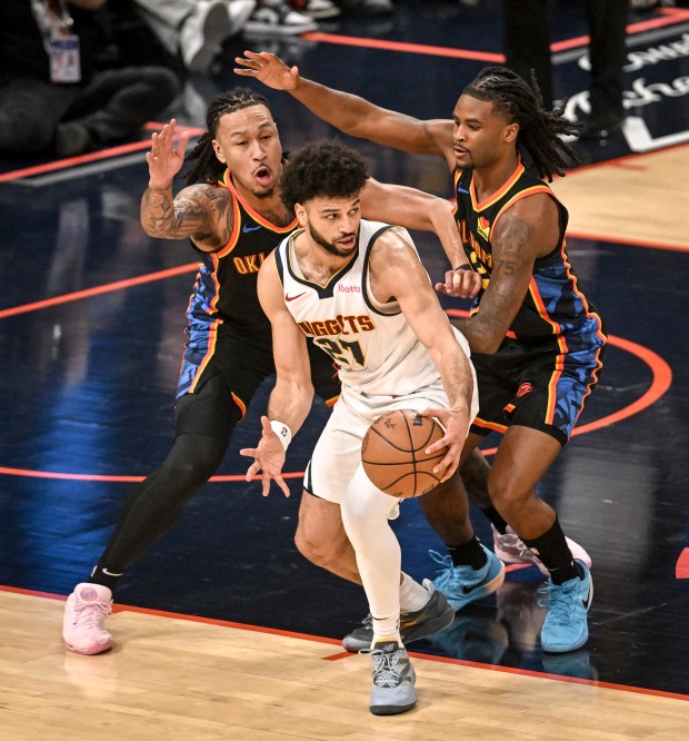 Jamal Murray (27) of the Denver Nuggets works as Jaylin...