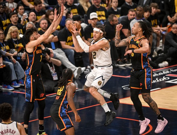 Aaron Gordon (32) of the Denver Nuggets passes as Chet...