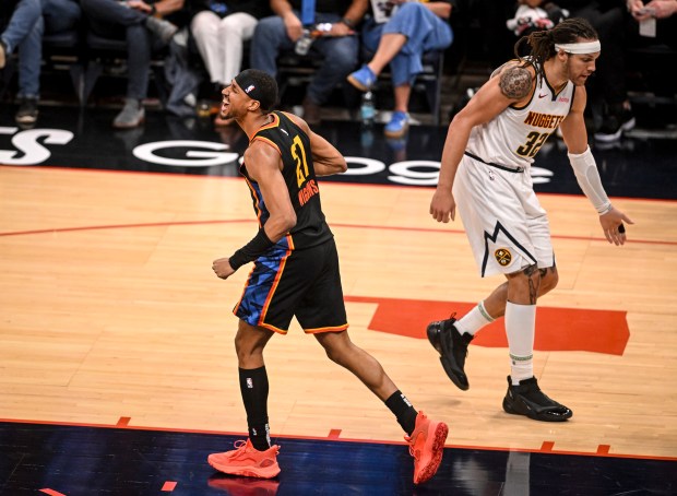 Aaron Wiggins (21) of the Oklahoma City Thunder celebrates after...