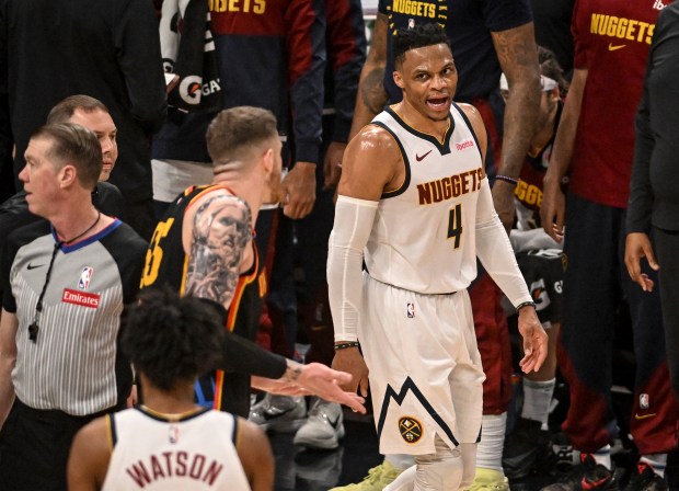 Russell Westbrook (4) of the Denver Nuggets exchanges words with...