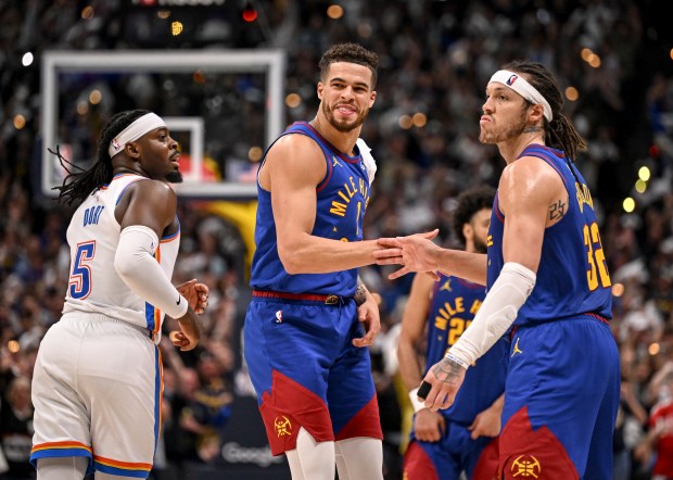 Michael Porter Jr. (1) of the Denver Nuggets smiles as...