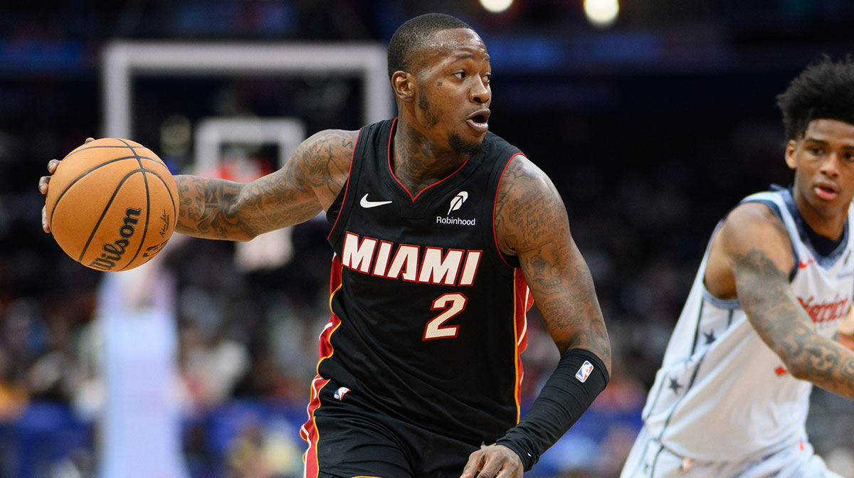 Miami Heat guard Terry Rozier (2) drives to the basket against Washington Wizards guard AJ Johnson (5) during the first quarter at Capital One Arena.