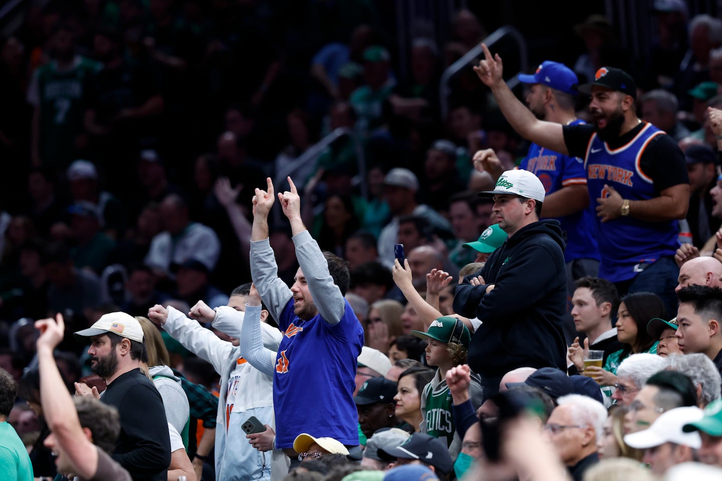 New York Knicks fans celebrated during the first quarter of Game 5 of the NBA Eastern Conference Semifinals against the Boston Celtics at TD Garden on May 14.