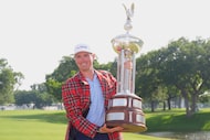 Ben Griffin celebrates after winning the Charles Schwab Challenge golf tournament at...